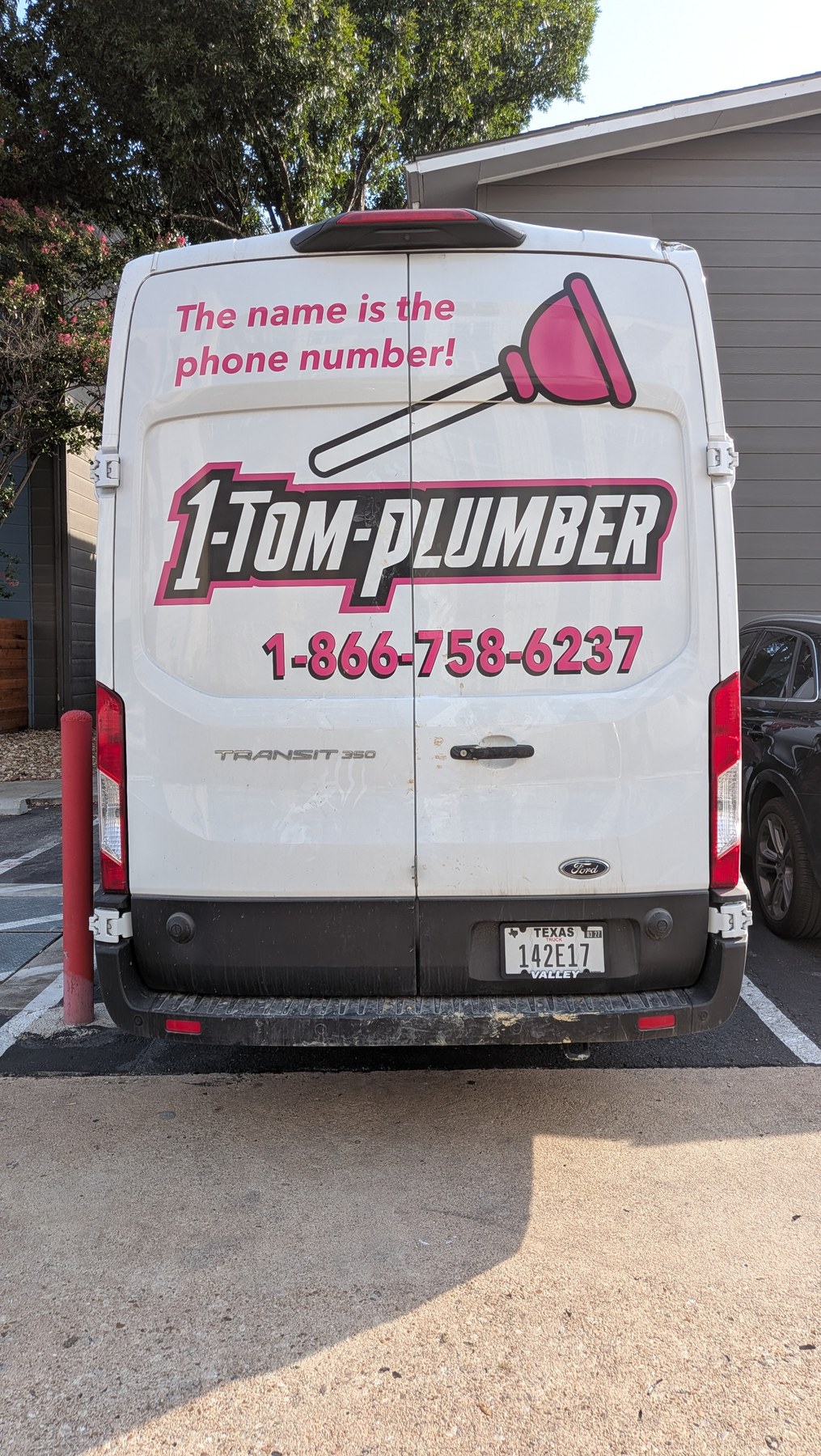 1-Tom-Plumber service van rear view