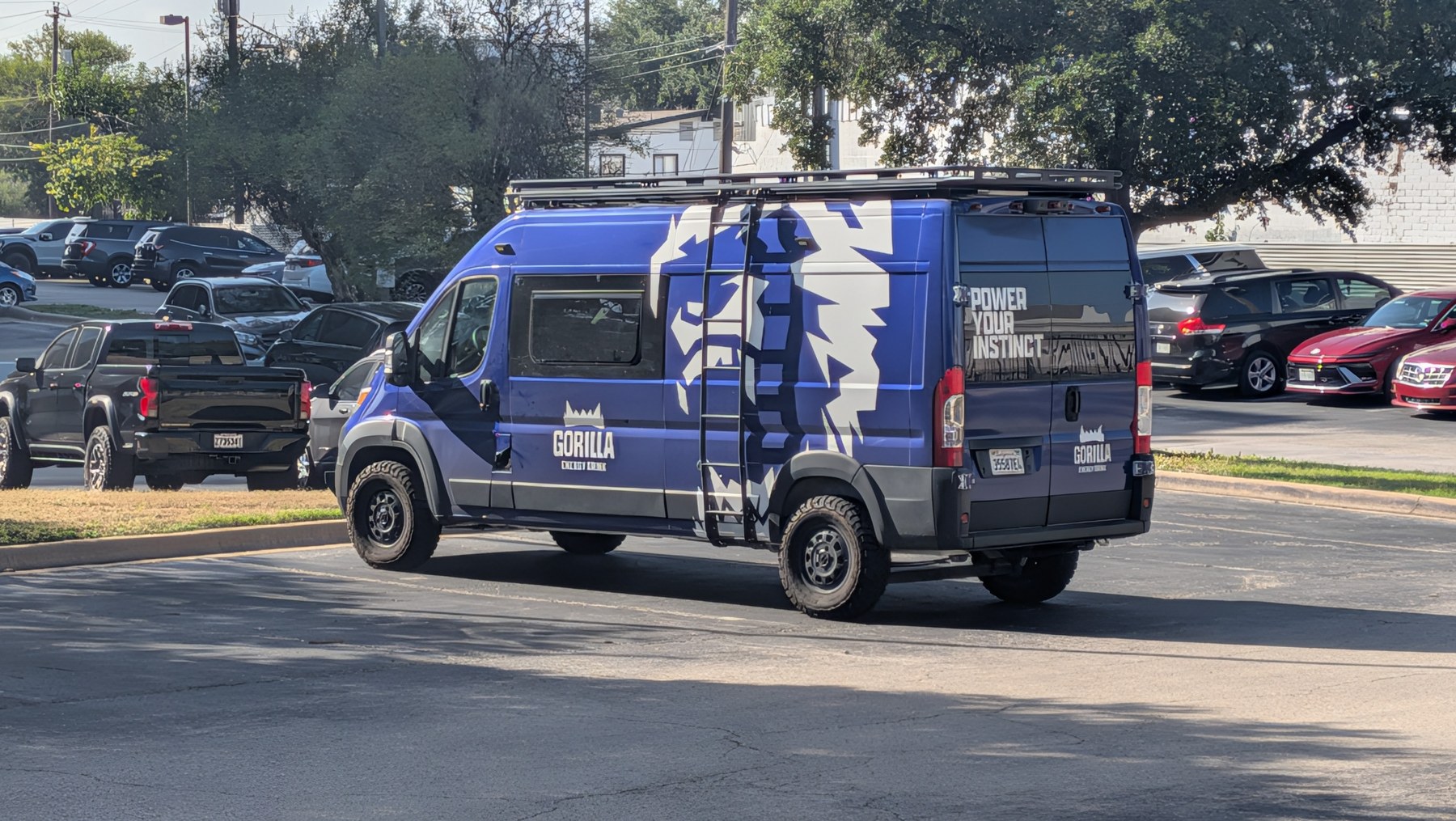 Gorilla Energy branded van driving in traffic