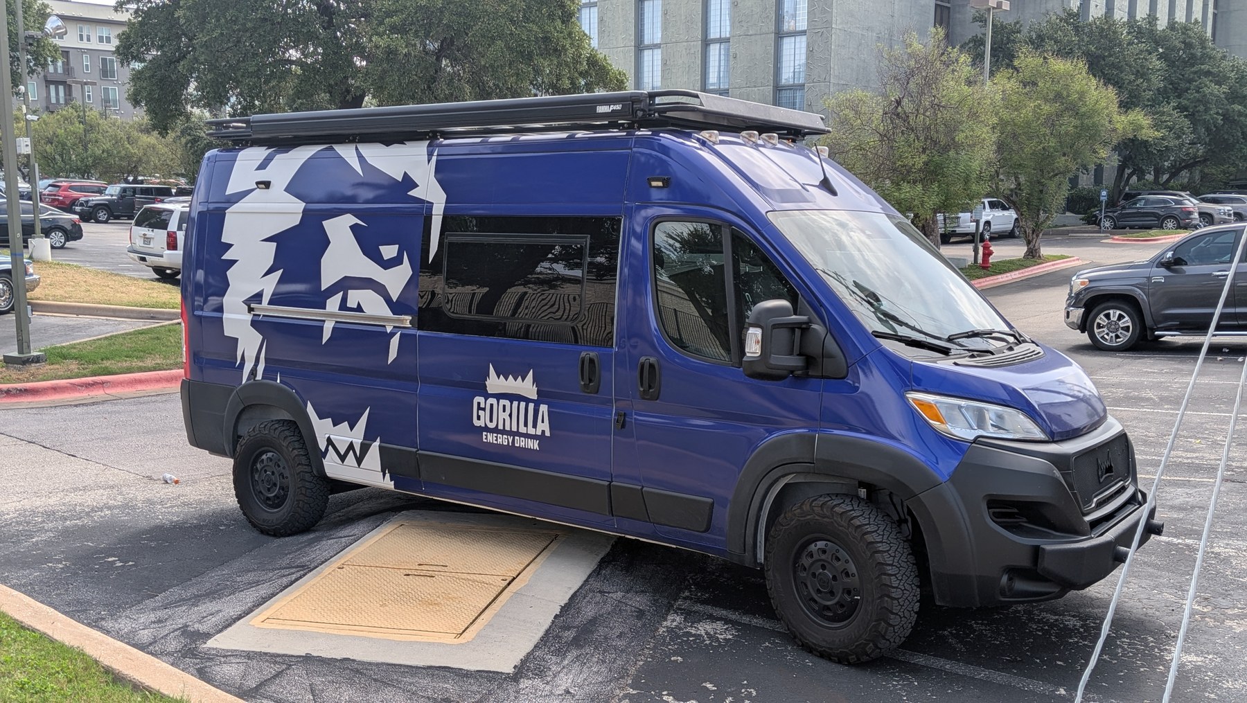 Gorilla Energy branded van with oversized gorilla graphic